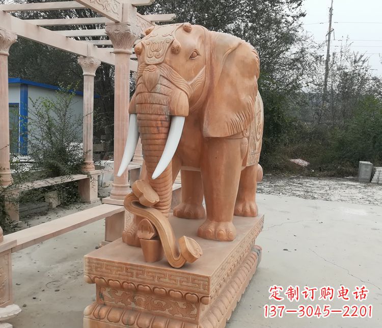 上海鼻卷如意的大象晚霞红门口镇宅石雕