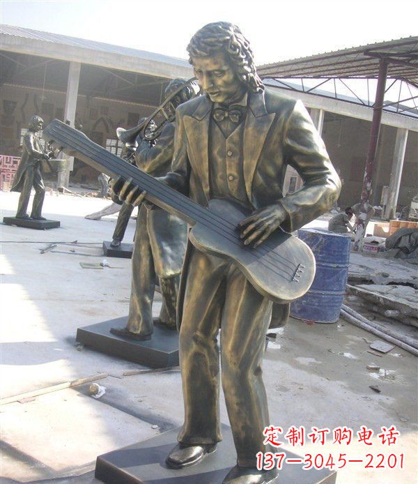 上海西方人物铜吉他雕塑