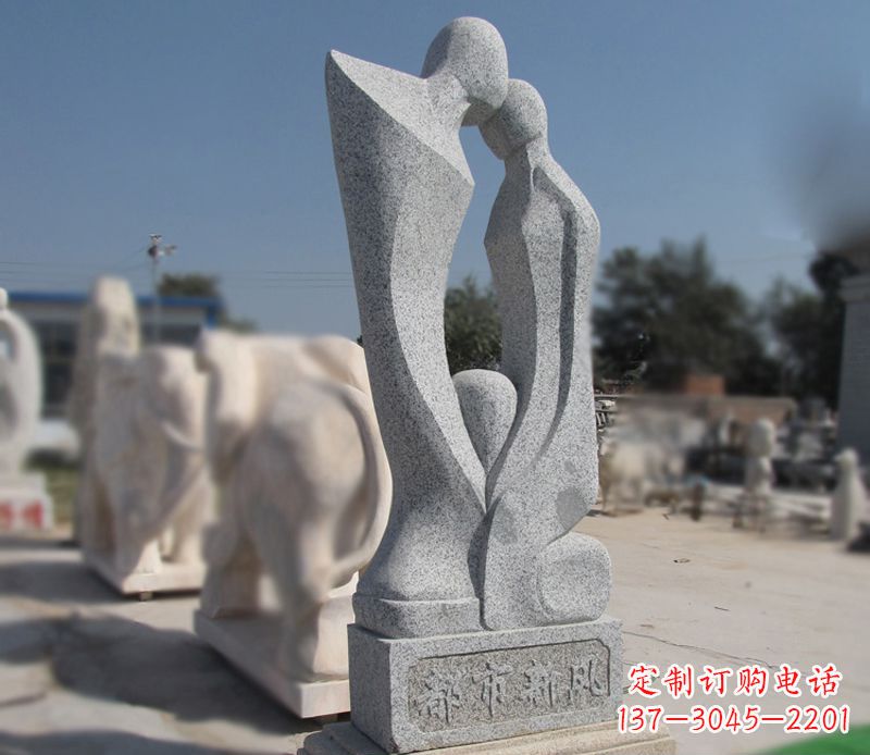 上海青石抽象情侣雕塑