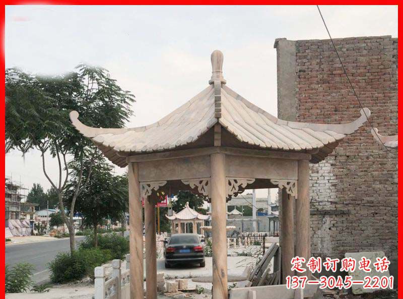 上海公园晚霞红六角石凉亭雕塑