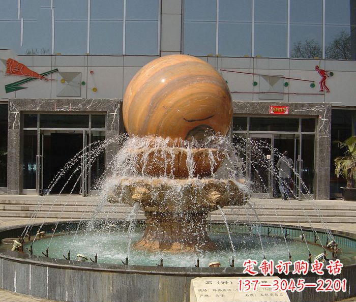 上海石来运转球晚霞红风水球石雕