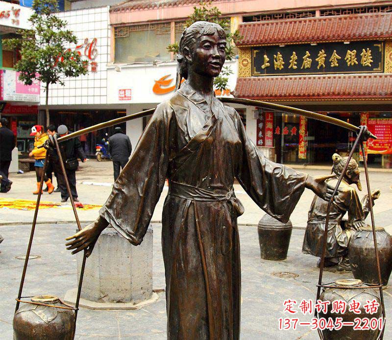 上海挑着罐子的古代女人铜雕