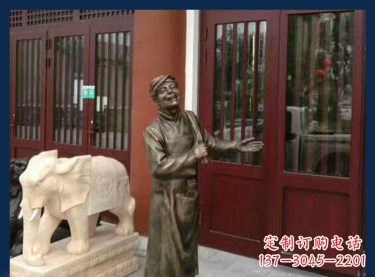 上海铜雕店小二酒店迎宾人物雕塑