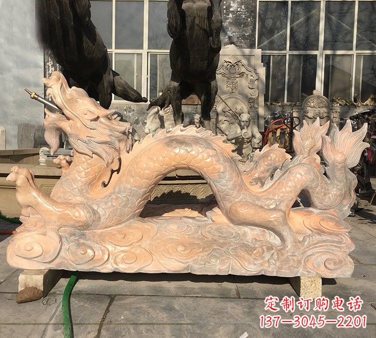 上海晚霞红石雕喷水龙