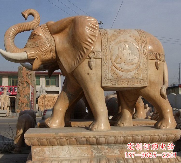 上海晚霞红石雕如意大象