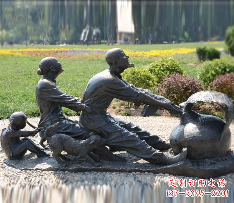 上海祖孙三人拔萝卜铜雕