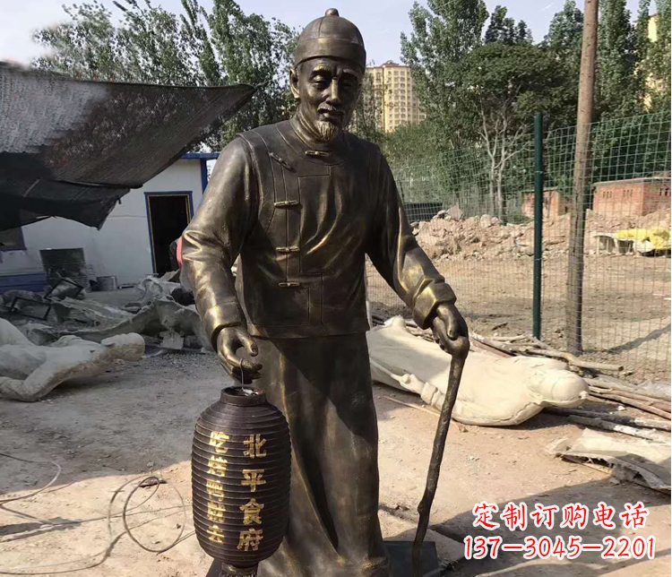 上海提灯笼的老人铜雕